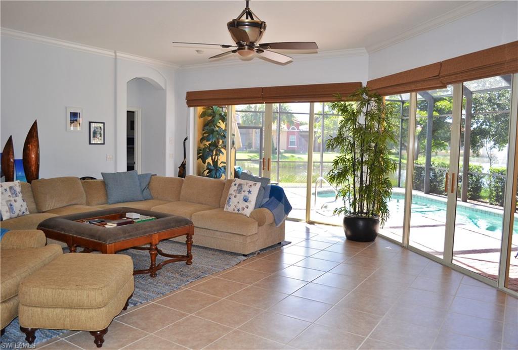 22160 Ponte Romano Lane Estero, FL 33928 - Photo 5 of 17 a living room with furniture and a large window
