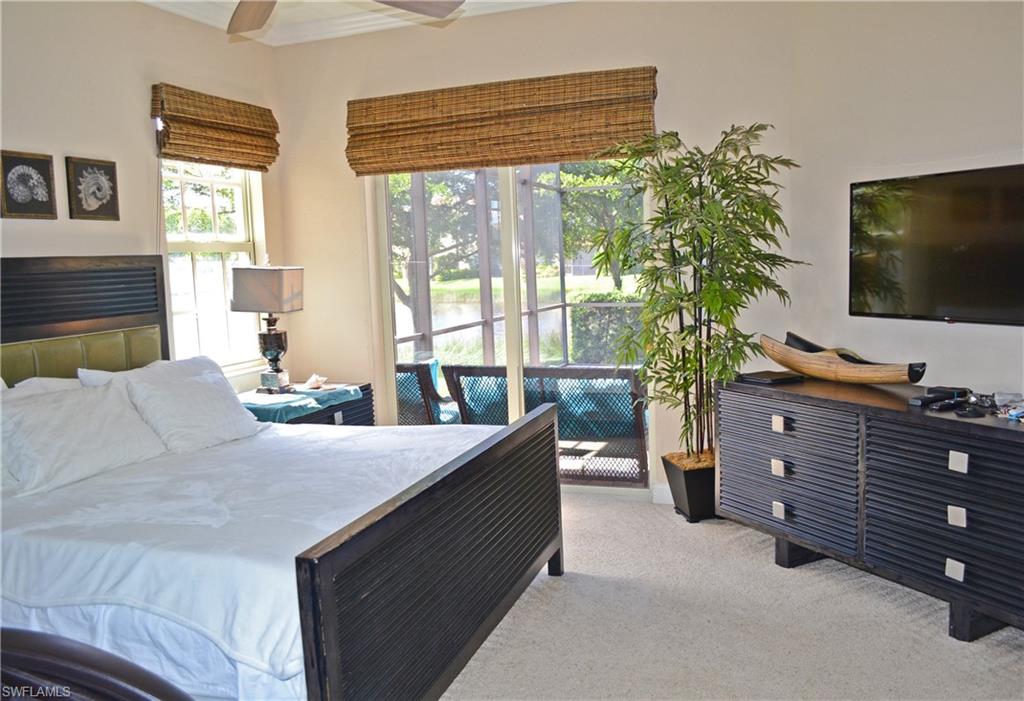 22160 Ponte Romano Lane Estero, FL 33928 - Photo 10 of 17 a living room with furniture and a flat screen tv