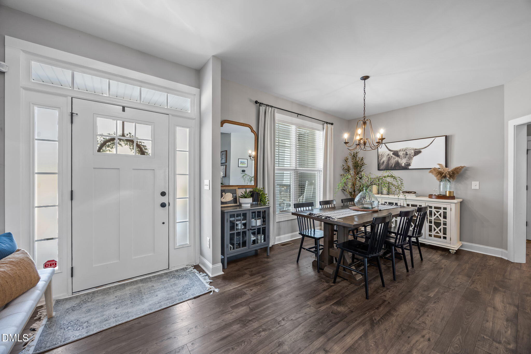 2265 Lacy Holt Road Graham, NC 27253 - Photo 11 of 43 a view of a dining room with furniture window and wooden floor