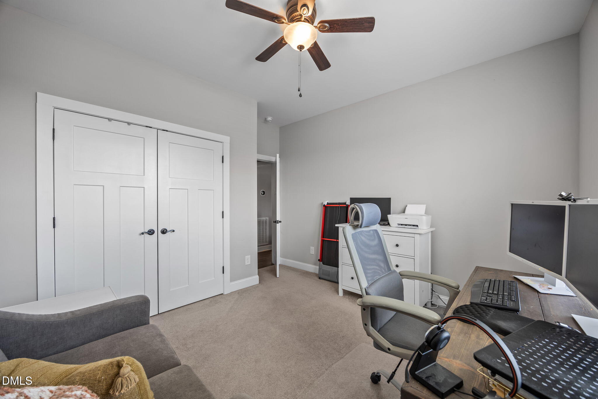 2265 Lacy Holt Road Graham, NC 27253 - Photo 16 of 43 a view of a livingroom with workspace and a couch