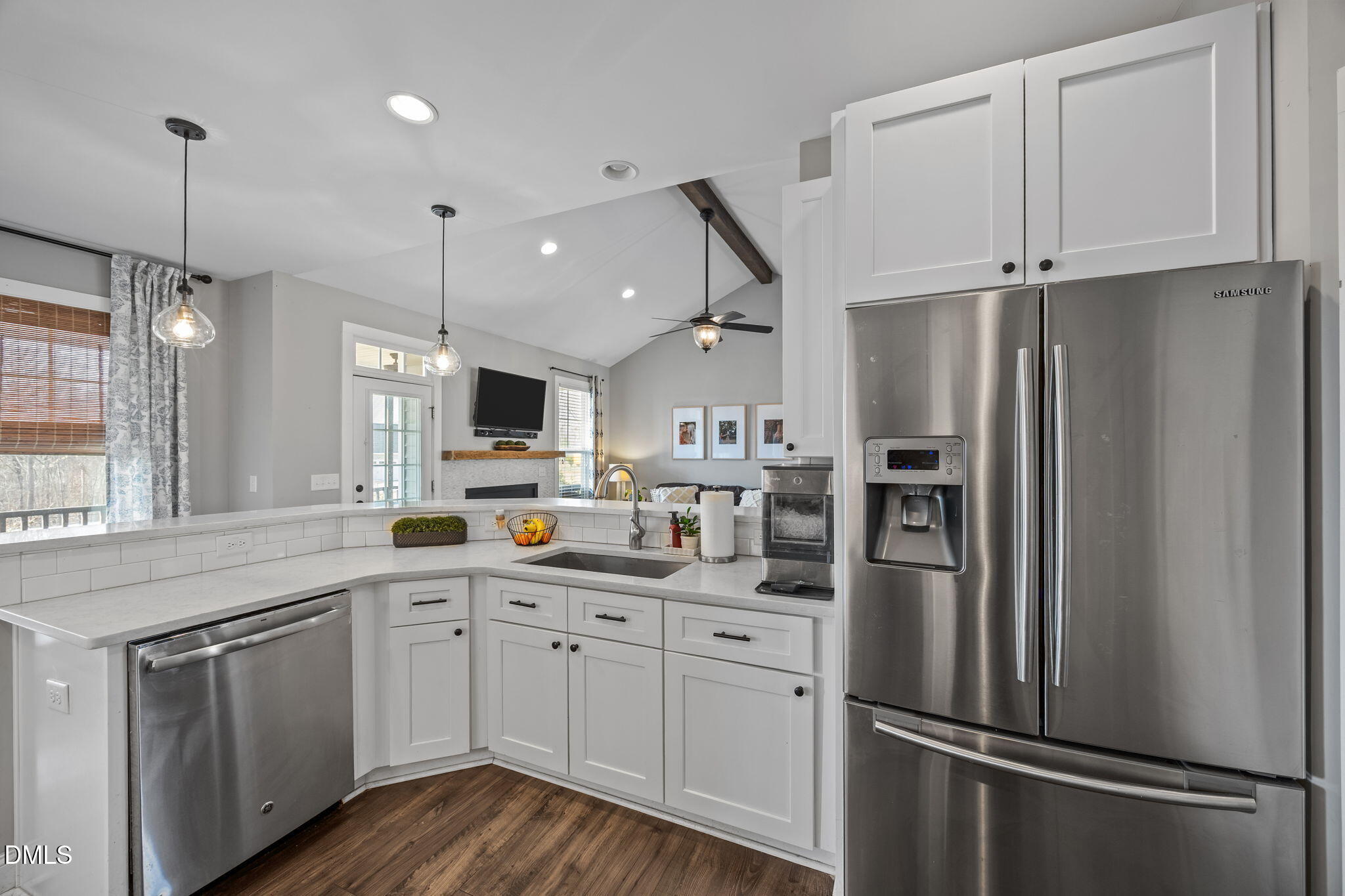 2265 Lacy Holt Road Graham, NC 27253 - Photo 21 of 43 a kitchen with kitchen island white cabinets and stainless steel appliances