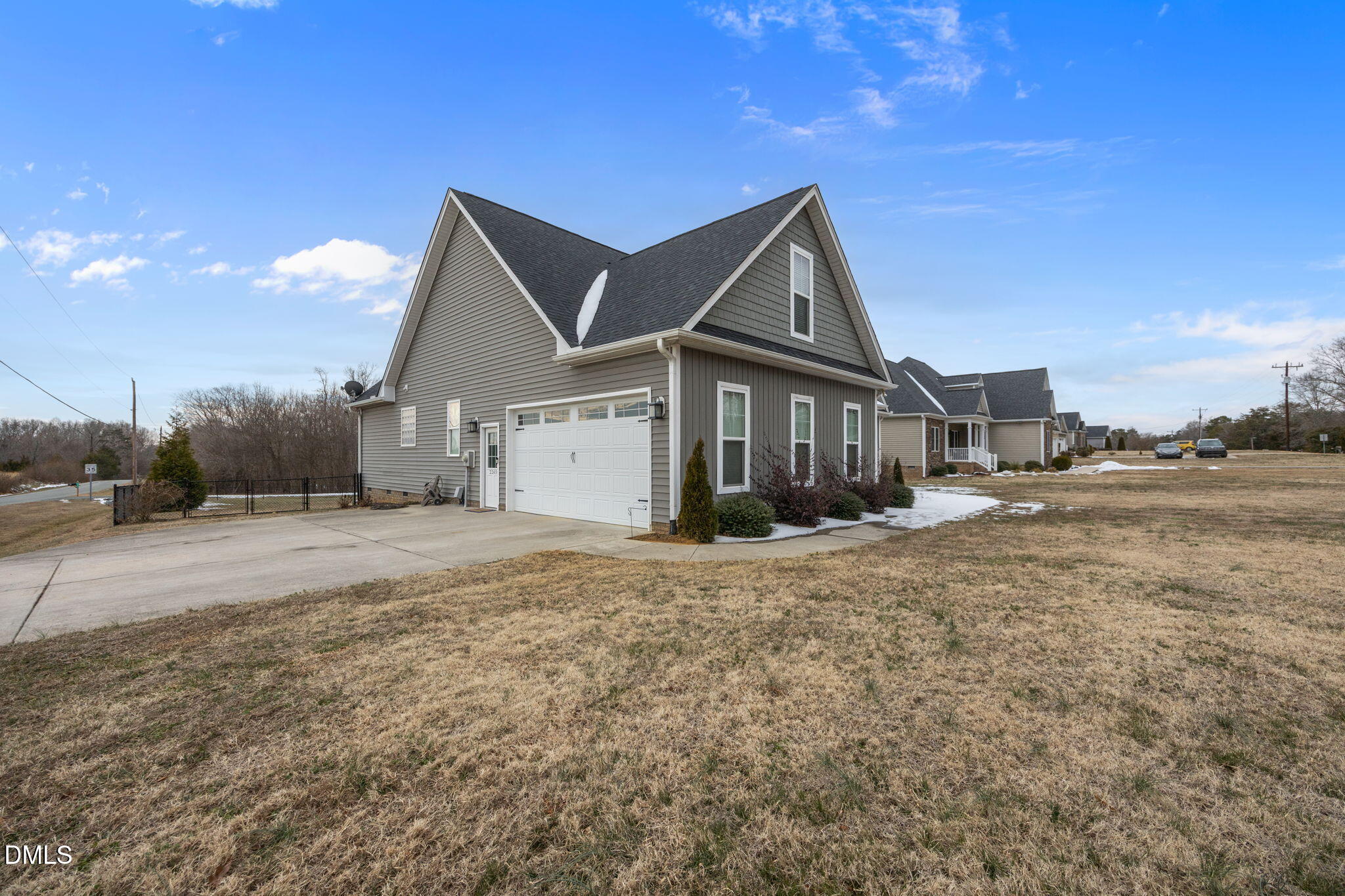 2265 Lacy Holt Road Graham, NC 27253 - Photo 33 of 43 a view of a house with a yard