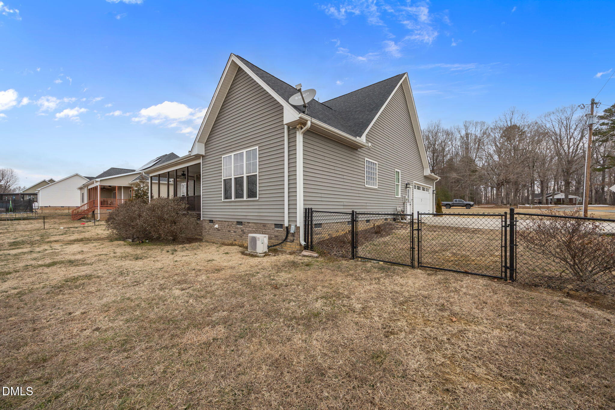 2265 Lacy Holt Road Graham, NC 27253 - Photo 34 of 43 a view of a house with wooden fence