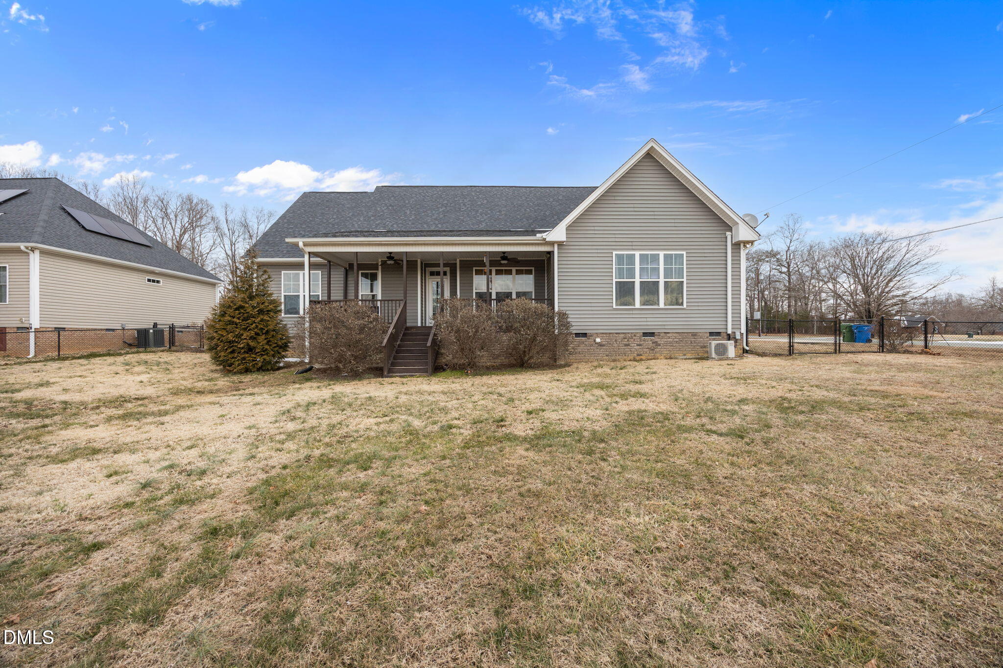 2265 Lacy Holt Road Graham, NC 27253 - Photo 35 of 43 a front view of house with yard and trees