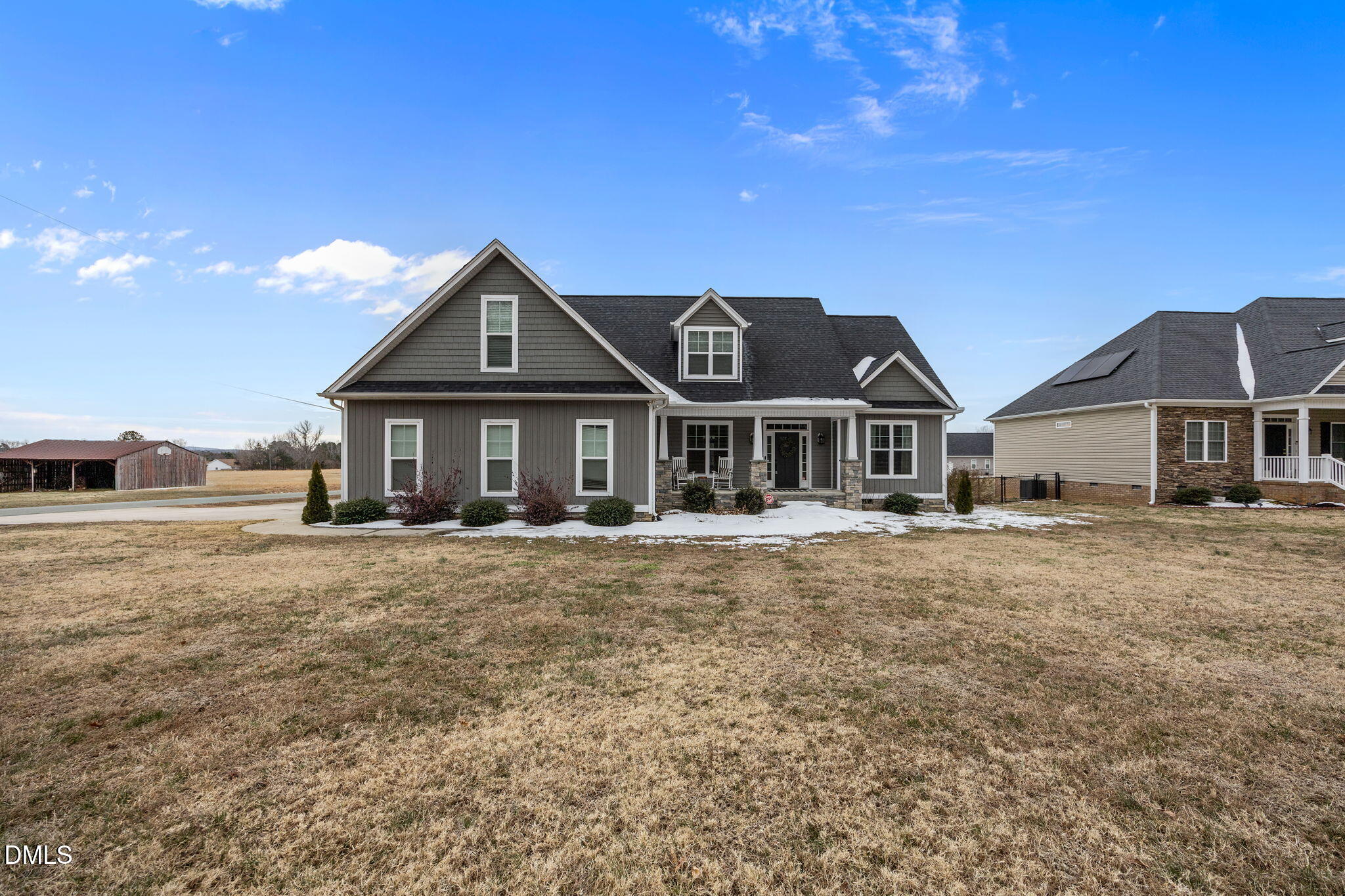 2265 Lacy Holt Road Graham, NC 27253 - Photo 4 of 43 a front view of a house with a yard