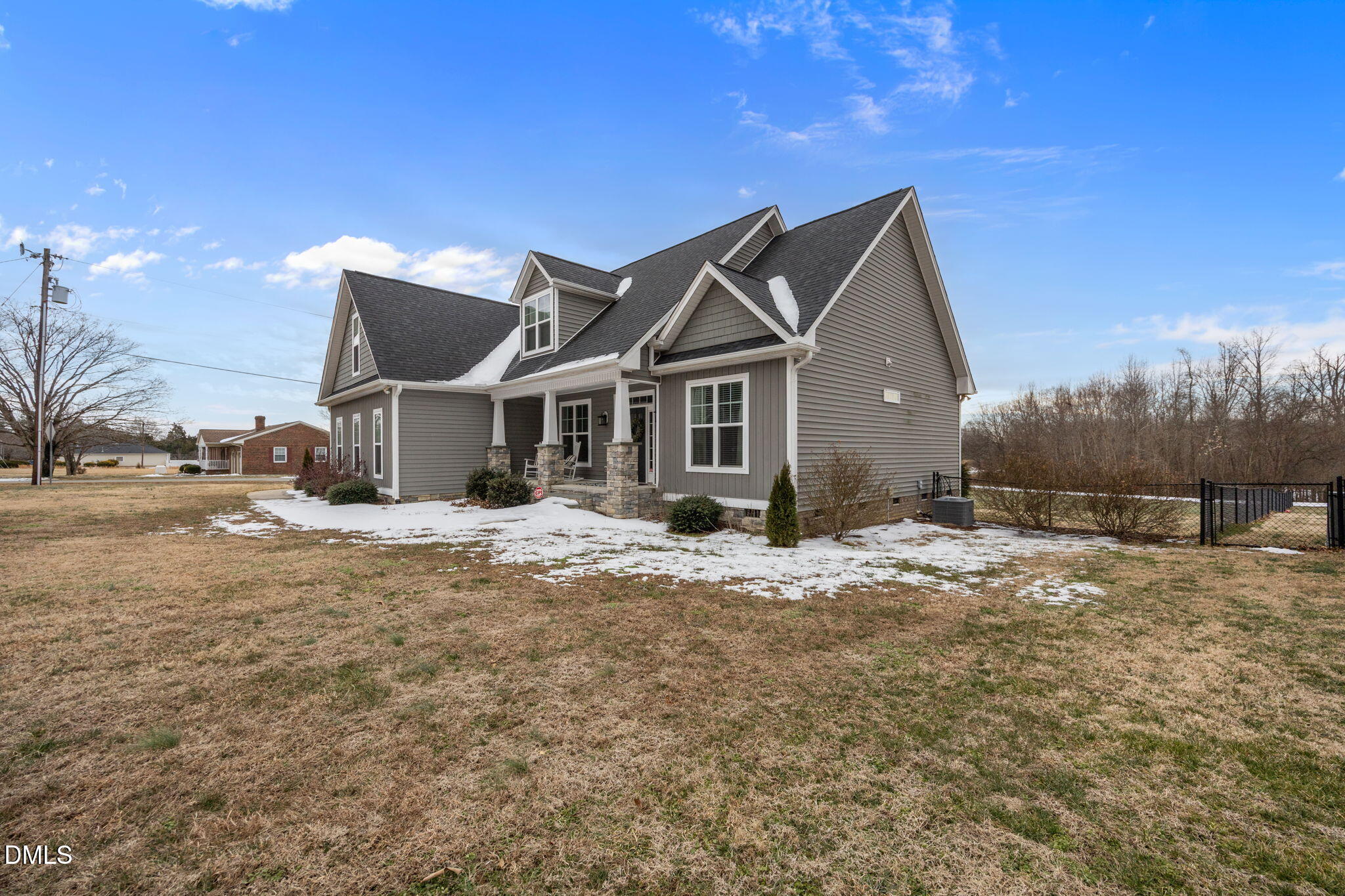 2265 Lacy Holt Road Graham, NC 27253 - Photo 5 of 43 a front view of a house with a yard