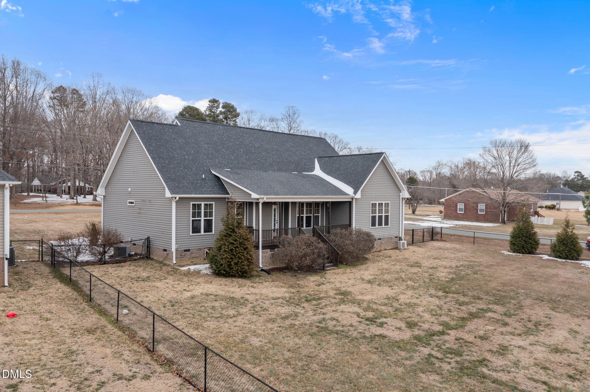 2265 Lacy Holt Road Graham, NC 27253 - Photo 9 of 43 a view of a house with a yard