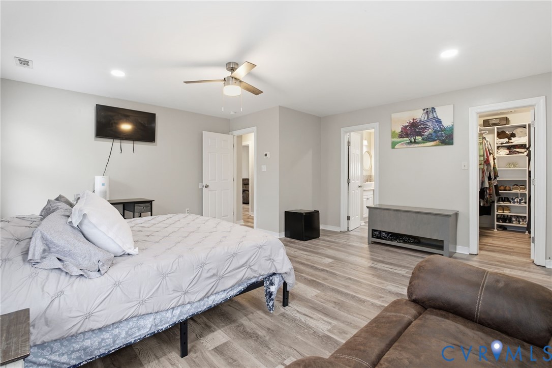 9110 Gayton Road Henrico, VA 23229 - Photo 25 of 54 a bedroom with a bed and a television