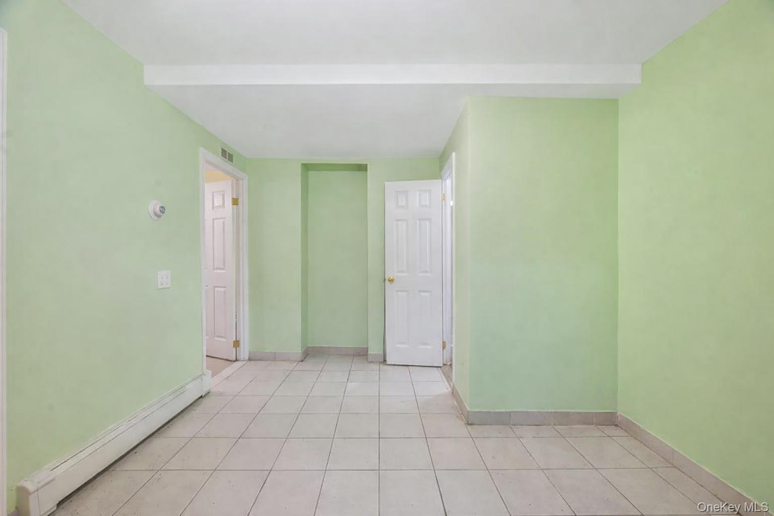 42-11 108th Street, Unit 1A Queens, NY 11368 - Photo 14 of 16 a view of an empty room