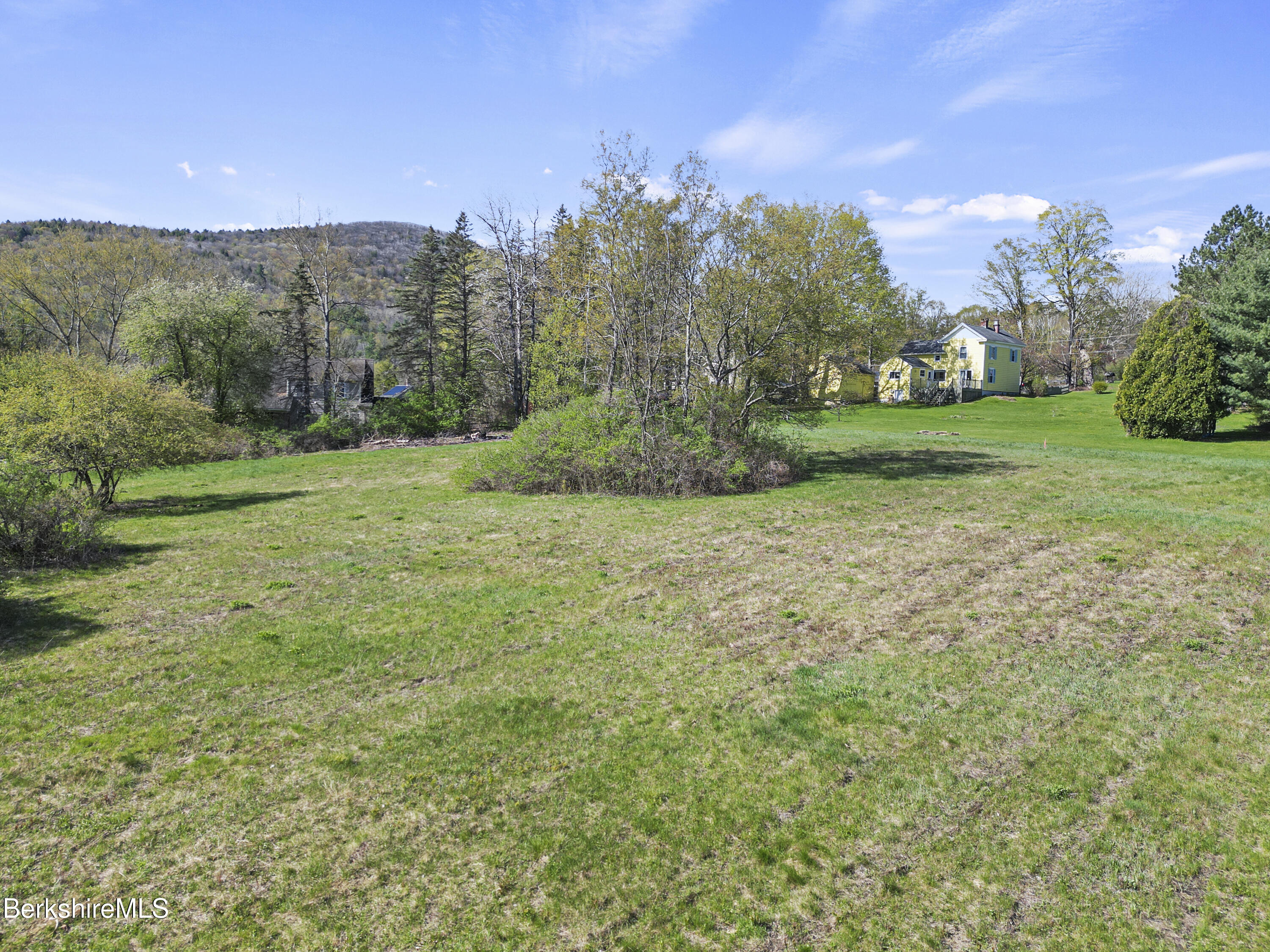 0 Church Street Lee, MA 01238 - Photo 11 of 16 a view of a field with trees in the background