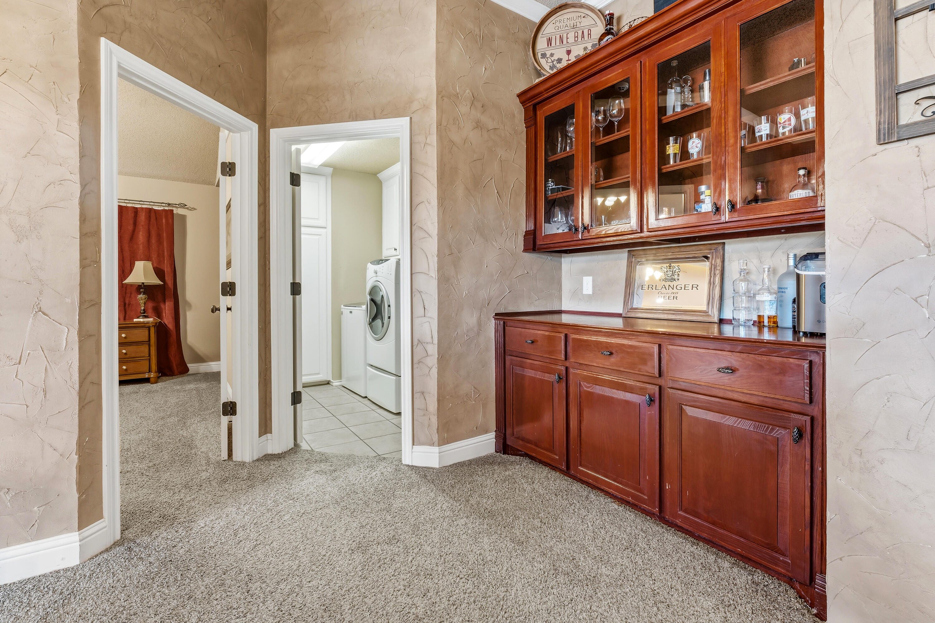 3017 104th Street Lubbock, TX 79423 - Photo 12 of 28 view of hall way with wooden cabinets