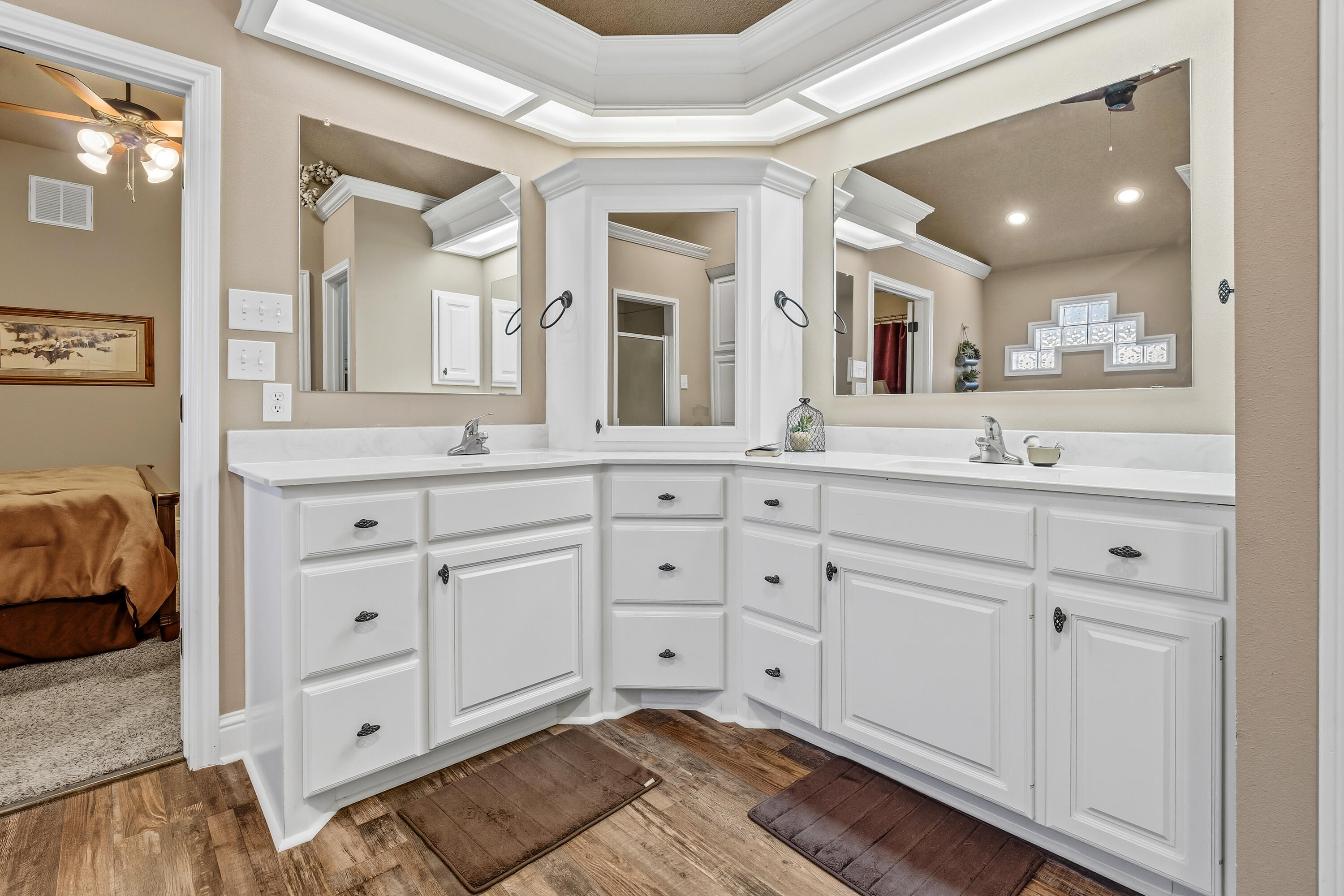 3017 104th Street Lubbock, TX 79423 - Photo 17 of 28 a spacious bathroom with a double vanity sink mirror and