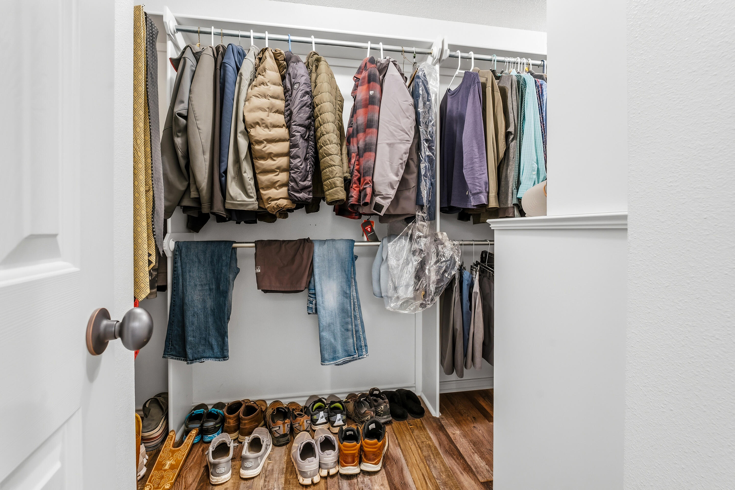 3017 104th Street Lubbock, TX 79423 - Photo 19 of 28 a view of walk in closet with clothes