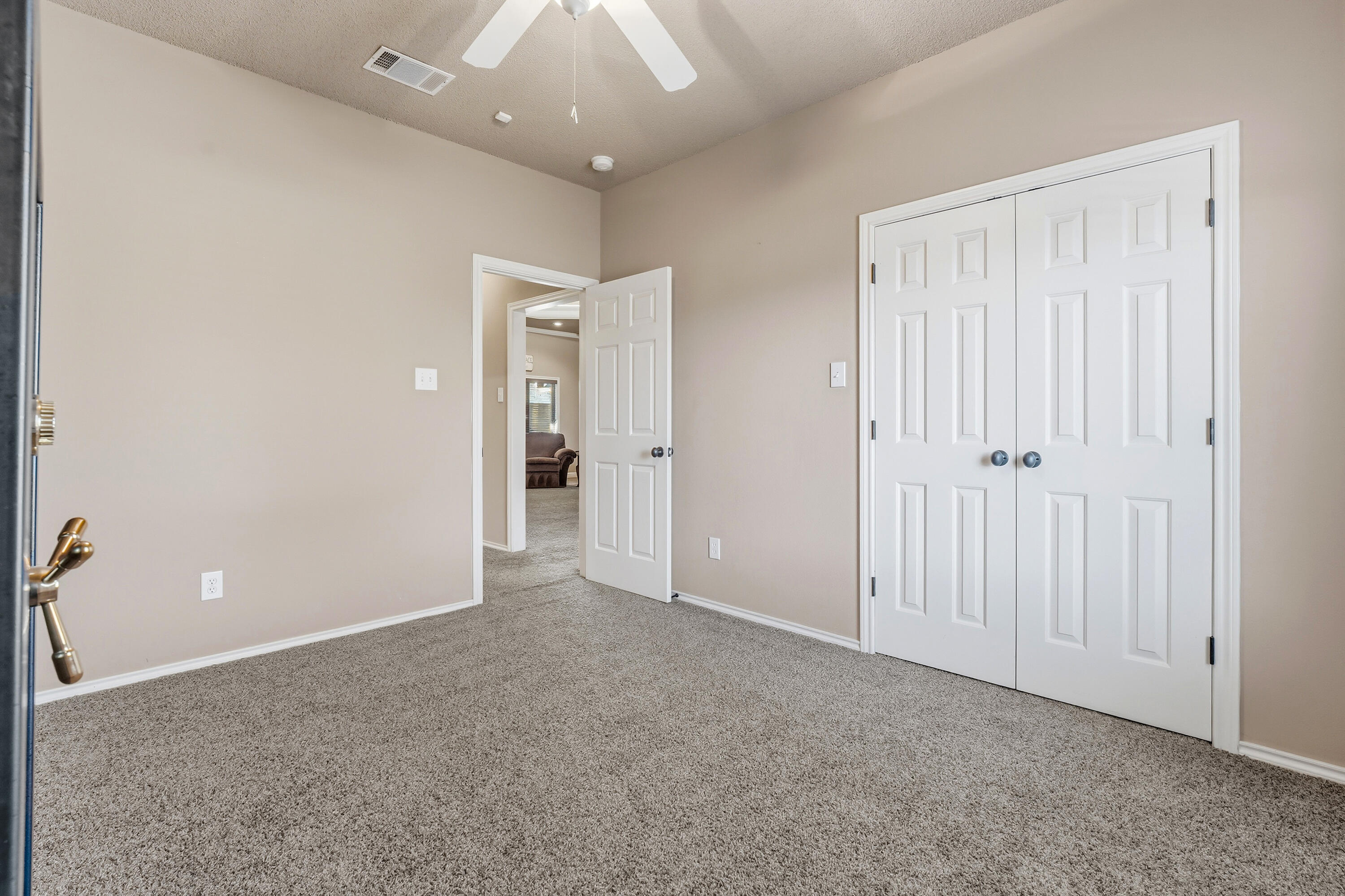 3017 104th Street Lubbock, TX 79423 - Photo 21 of 28 an empty room with an entryway