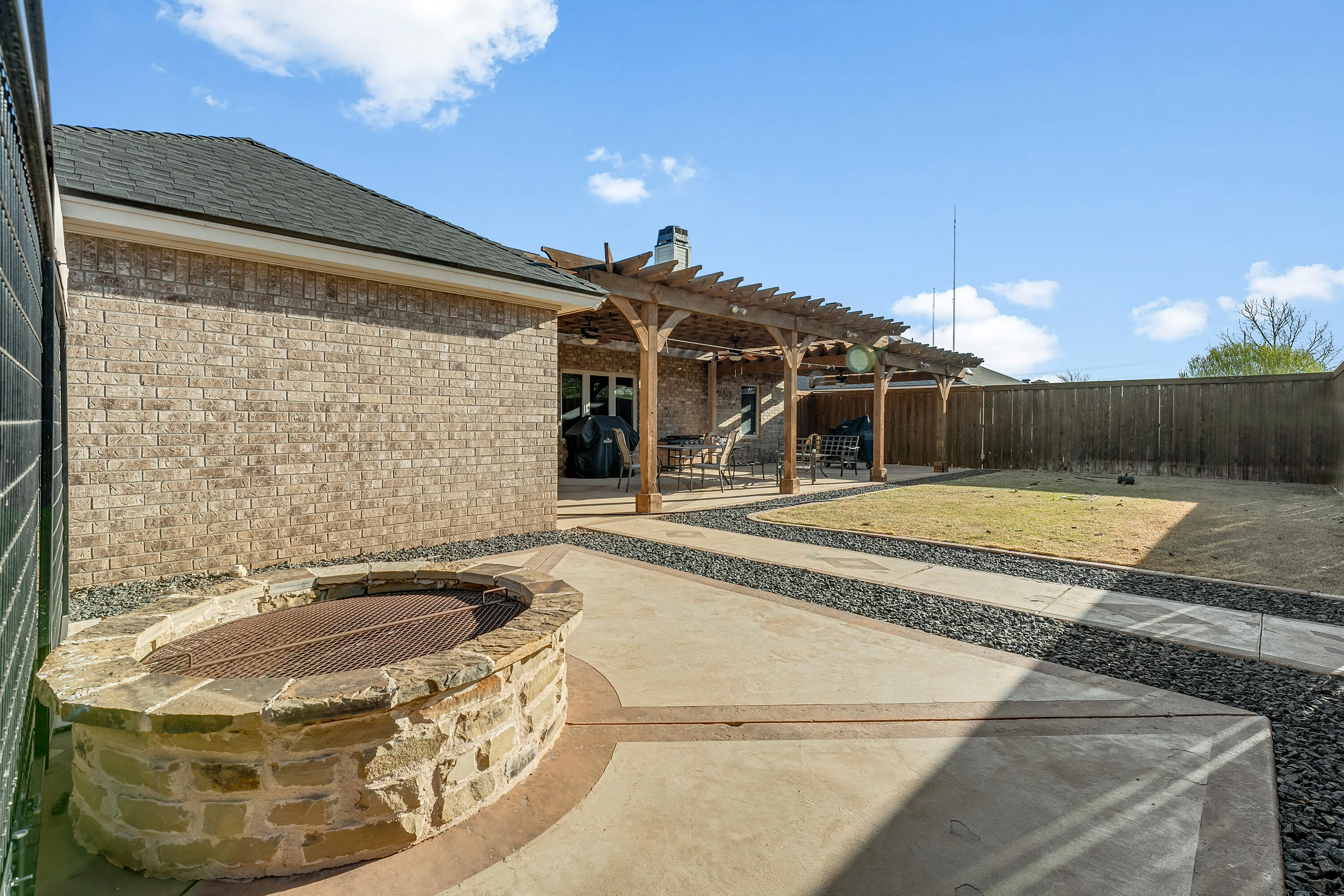 3017 104th Street Lubbock, TX 79423 - Photo 26 of 28 a view of a house with swimming pool and porch