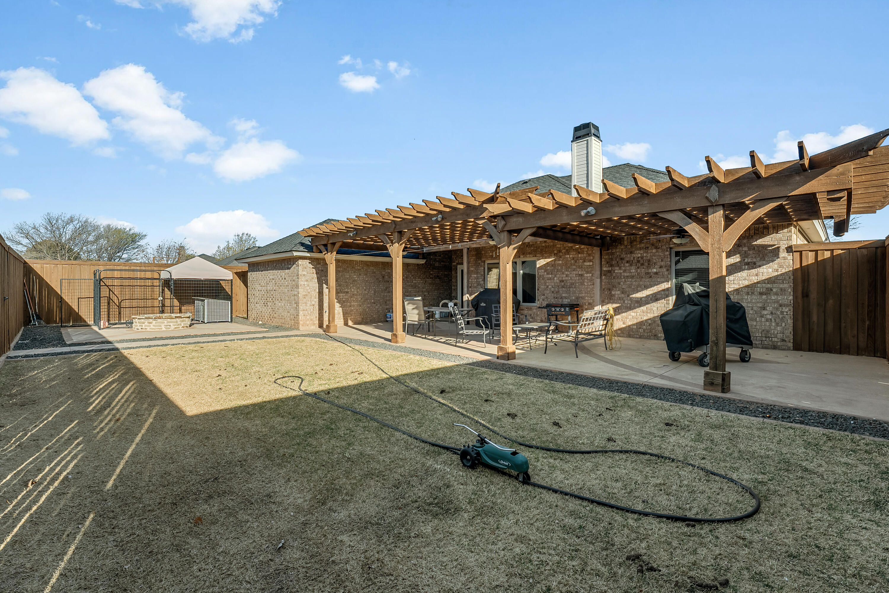 3017 104th Street Lubbock, TX 79423 - Photo 28 of 28 a front view of a house with a yard