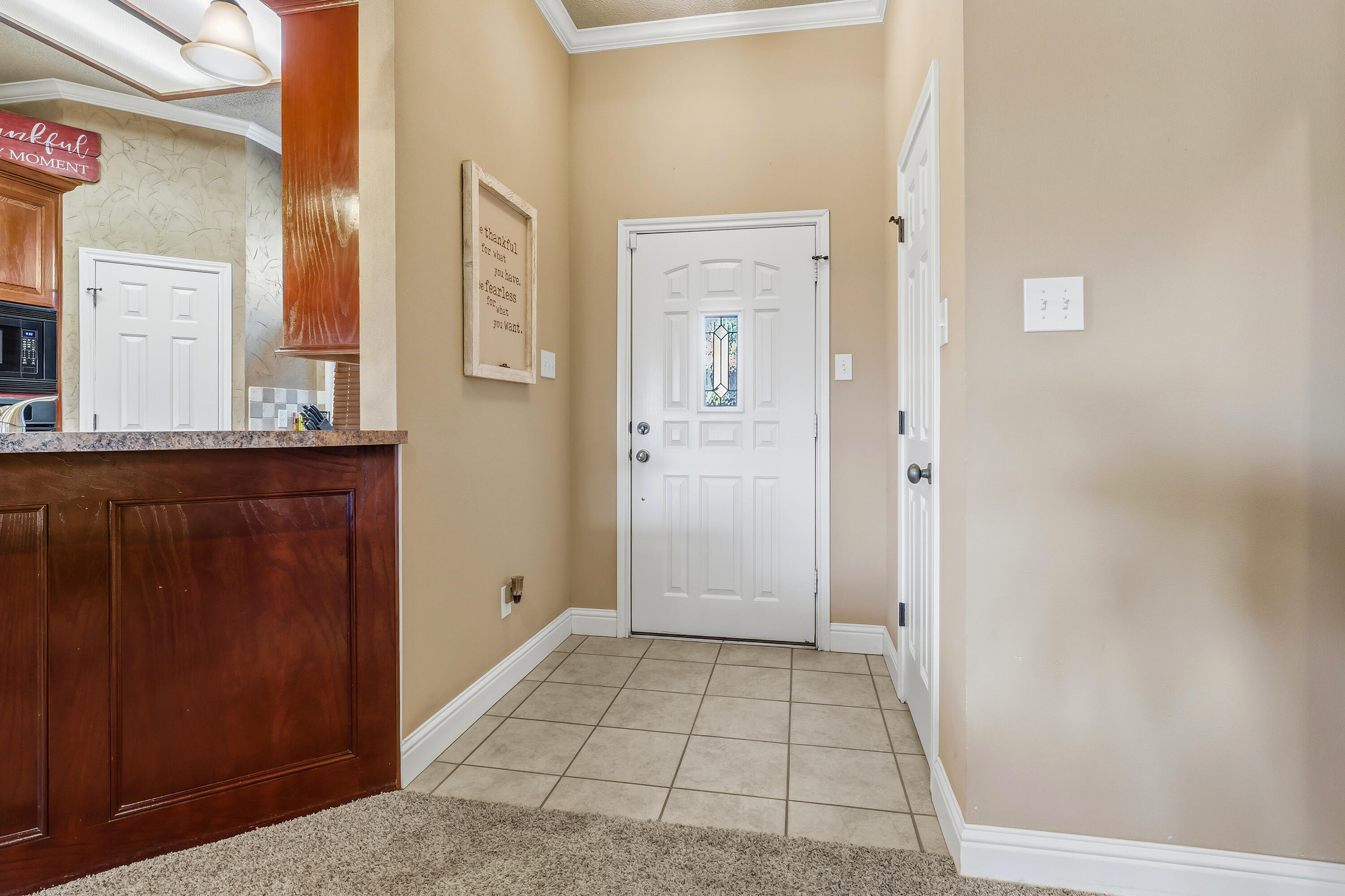 3017 104th Street Lubbock, TX 79423 - Photo 4 of 28 a view of a bathroom with a sink