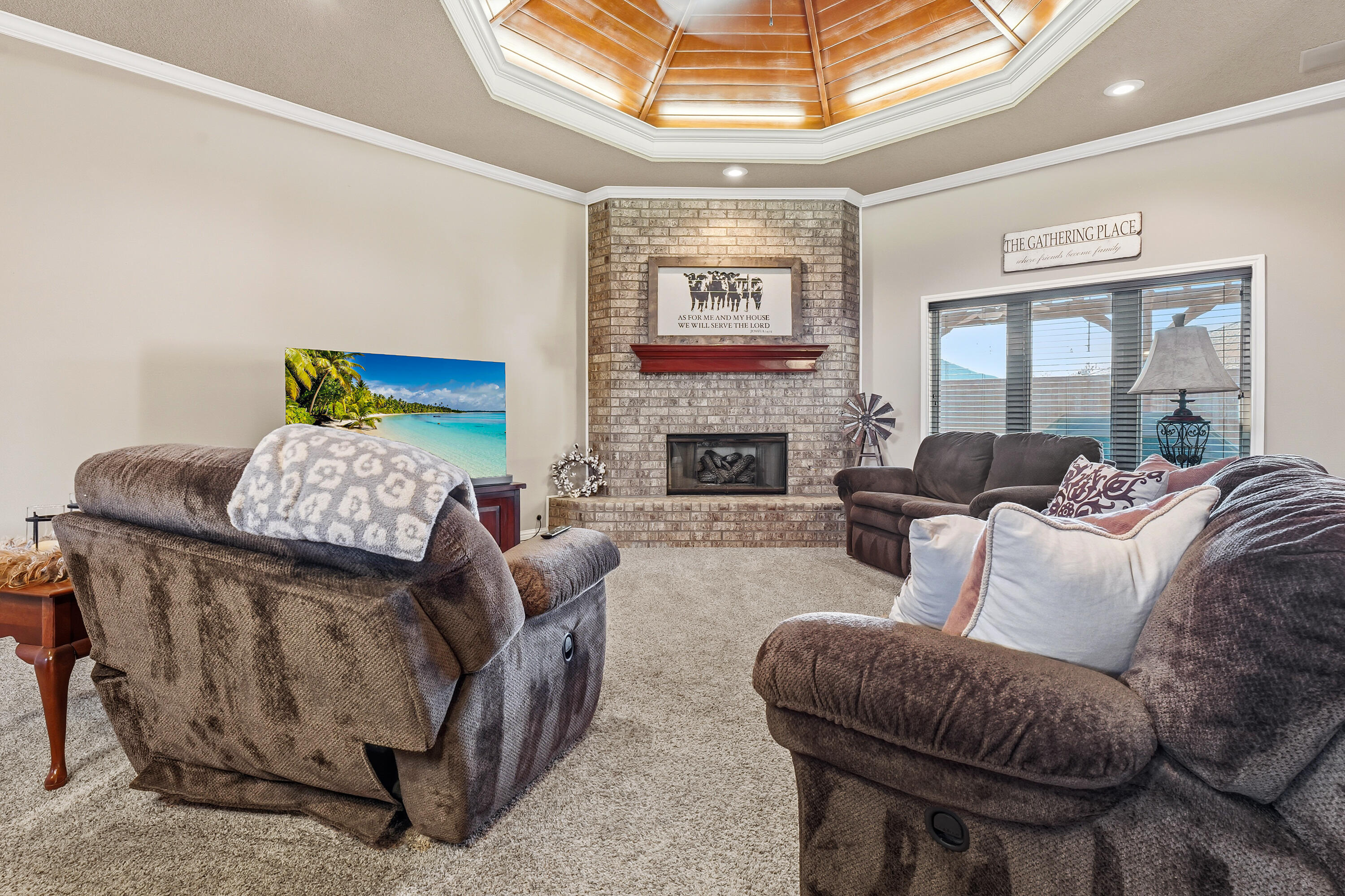 3017 104th Street Lubbock, TX 79423 - Photo 6 of 28 a living room with furniture and a fireplace