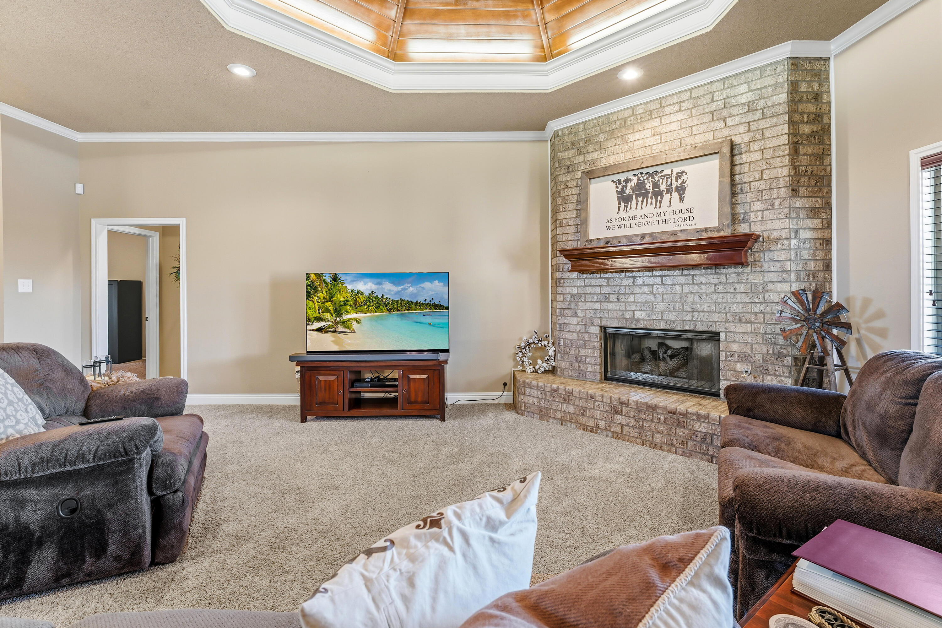 3017 104th Street Lubbock, TX 79423 - Photo 7 of 28 a living room with furniture and a fireplace