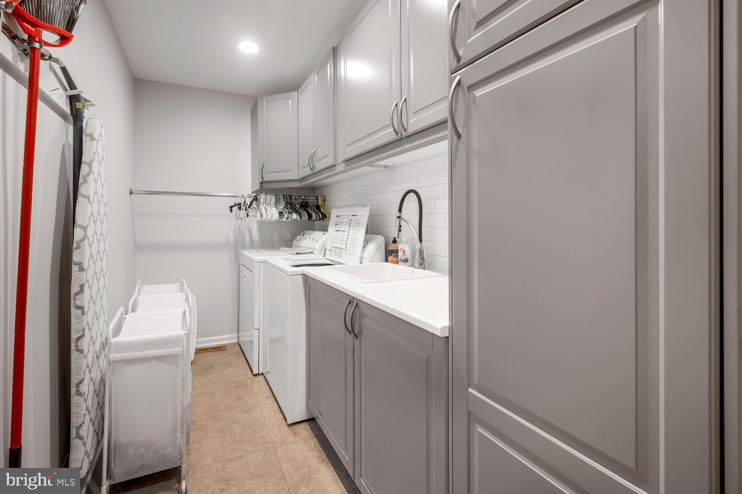 7906 Ivymount Terrace Potomac, MD 20854 - Photo 18 of 41 Expanded 1st floor laundry room of of kitchen