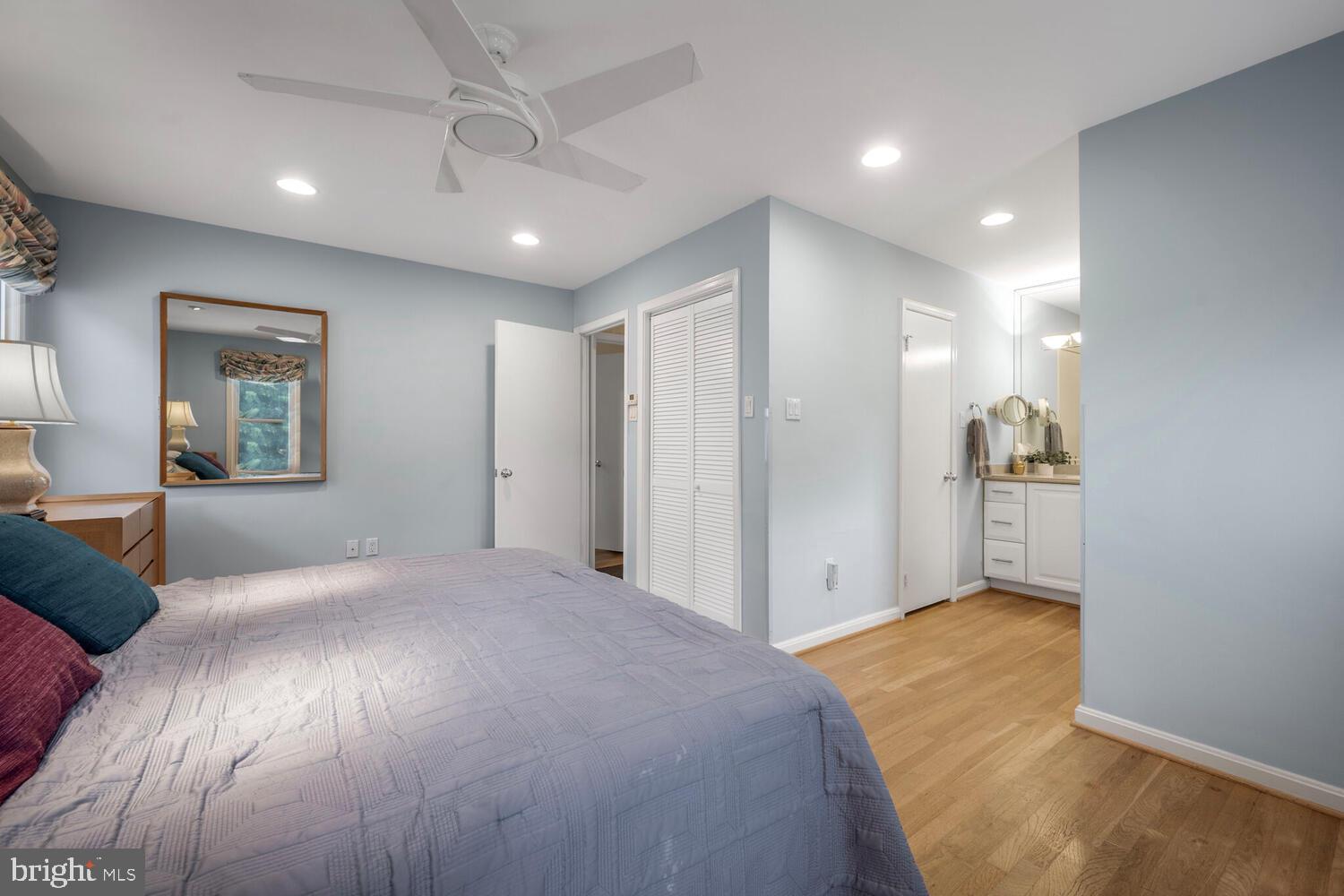 7906 Ivymount Terrace Potomac, MD 20854 - Photo 22 of 41 Primary bedroom with linen closet & walk-in closet