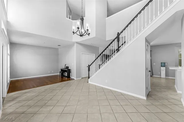 a view of a kitchen with cabinet and a workspace