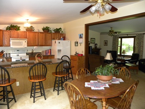 69 Gale Road Charlton, MA 01507 - Photo 6 of 30 a view of a dining room with furniture and wooden floor
