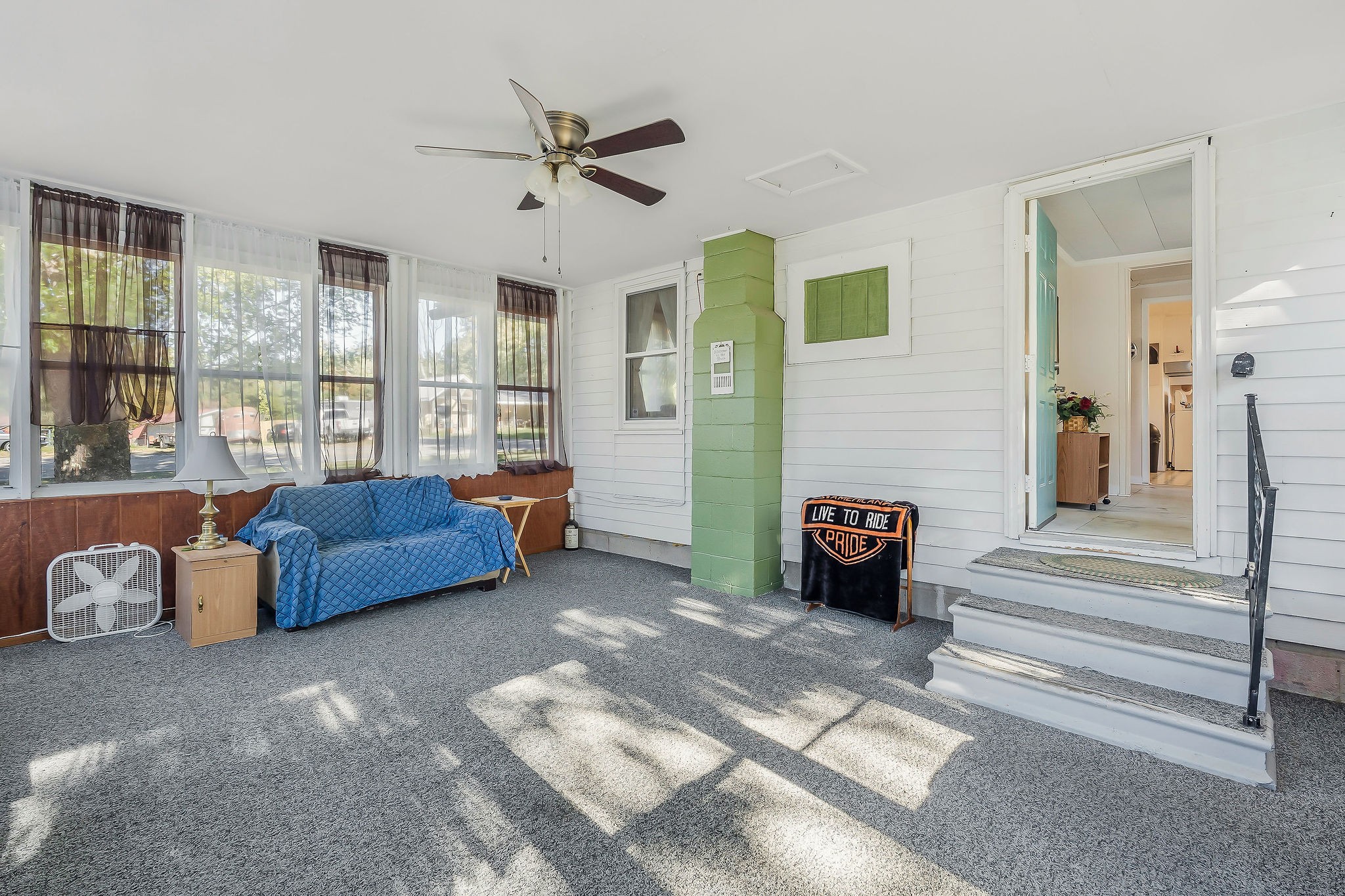 2634 Pine Grove Road Spencer, TN 38585 - Photo 11 of 33 a living room with furniture and a floor to ceiling window