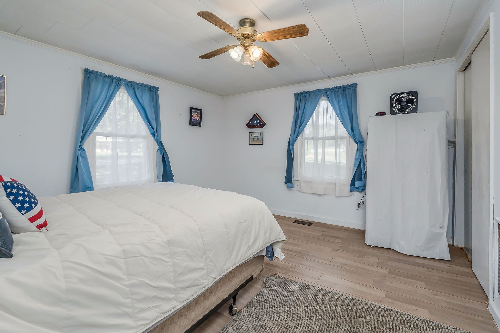 2634 Pine Grove Road Spencer, TN 38585 - Photo 18 of 33 a bedroom with a bed and a mirror