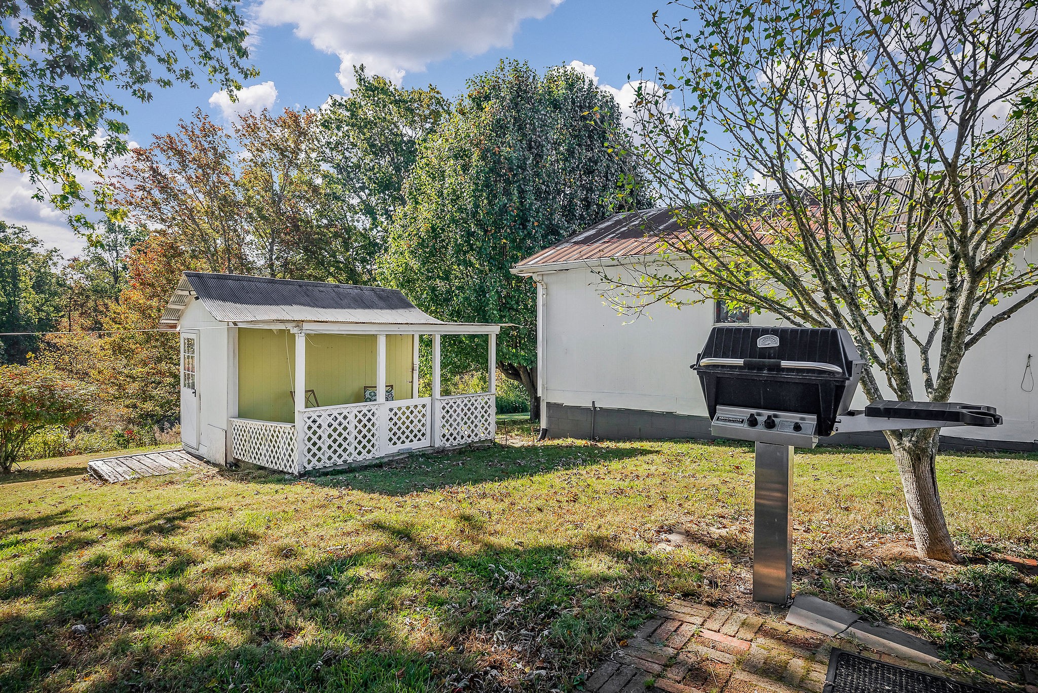 2634 Pine Grove Road Spencer, TN 38585 - Photo 20 of 33 a front view of a house with garden