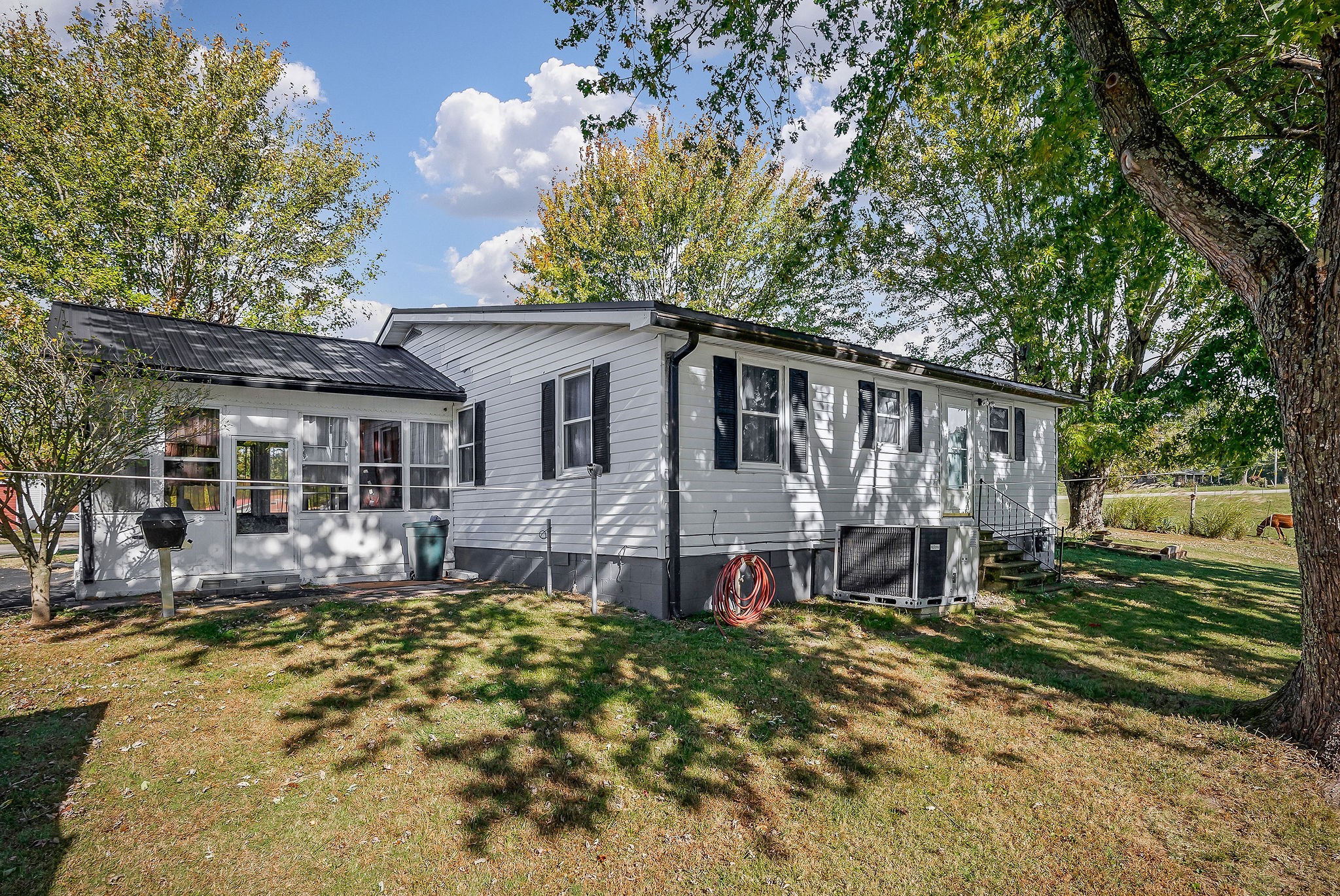 2634 Pine Grove Road Spencer, TN 38585 - Photo 24 of 33 a front view of a house with patio