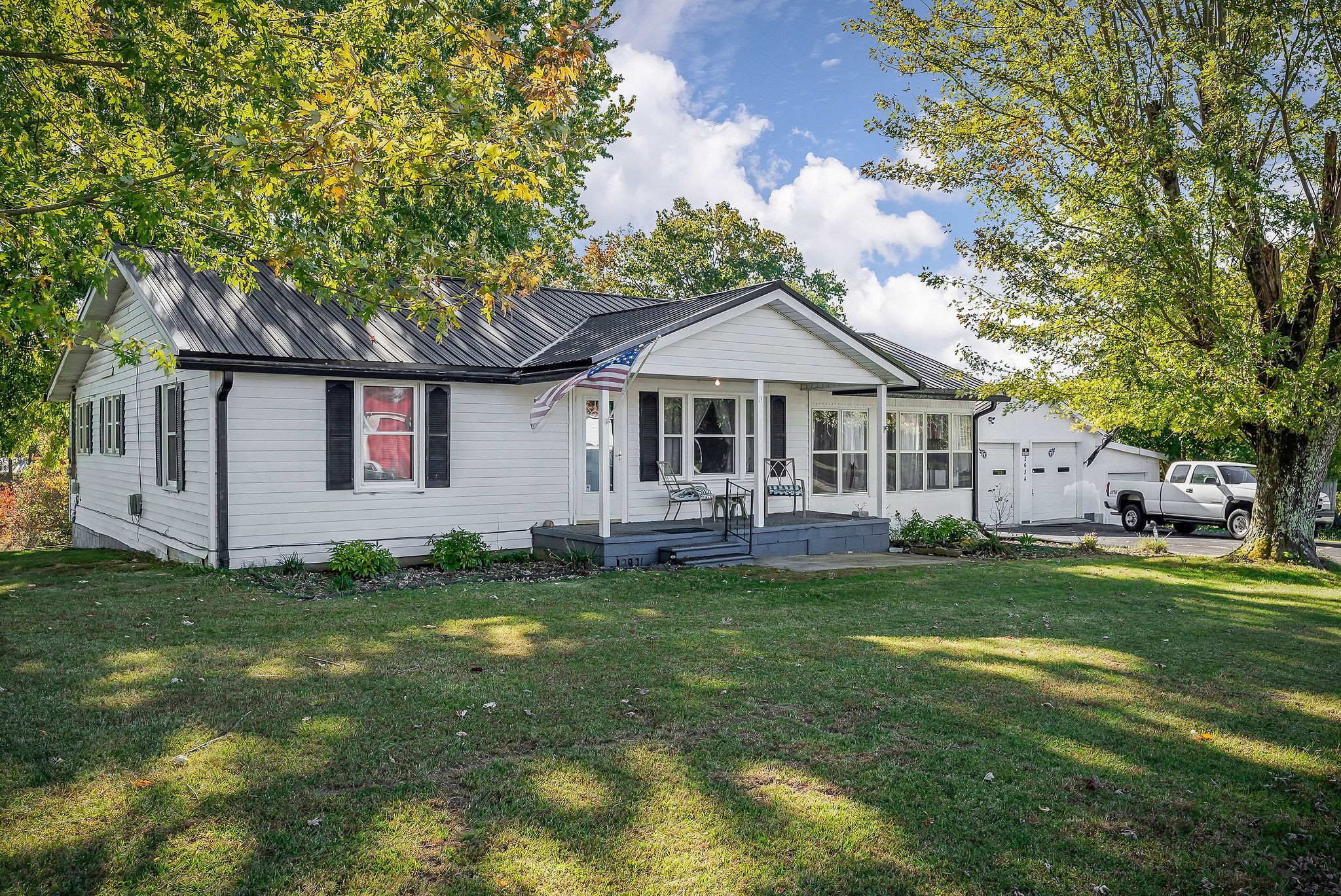 2634 Pine Grove Road Spencer, TN 38585 - Photo 32 of 33 a front view of a house with a garden