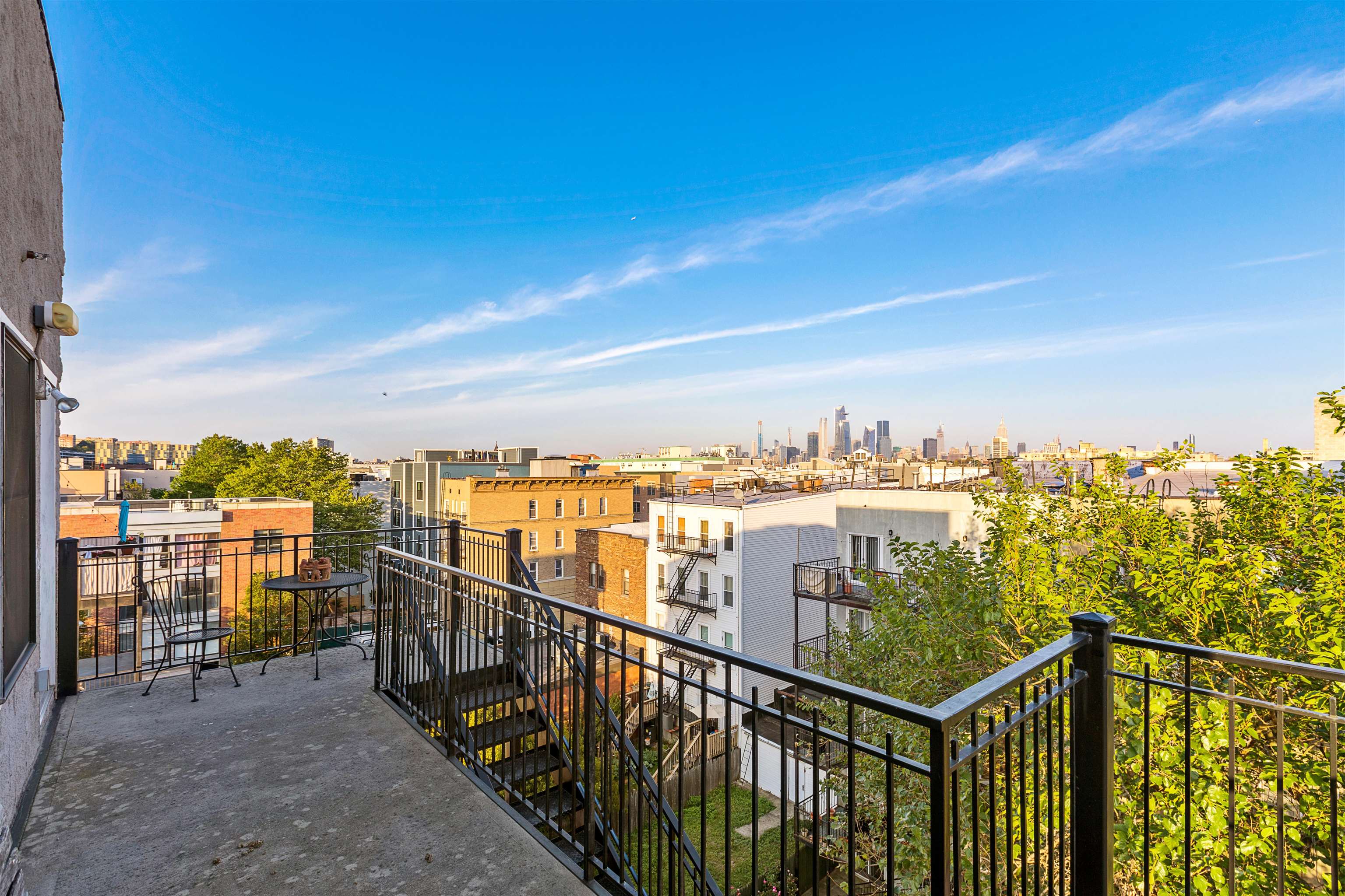 415 Jackson Street, Unit 4R Hoboken, NJ 07030 - Photo 11 of 13 a view of a city from a balcony