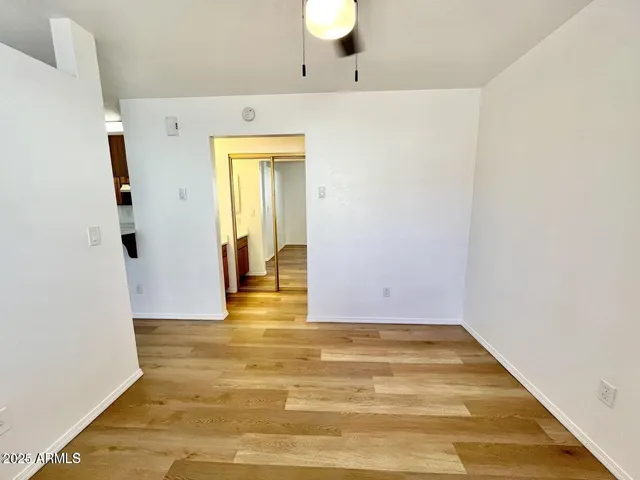 a view of a livingroom with wooden floor