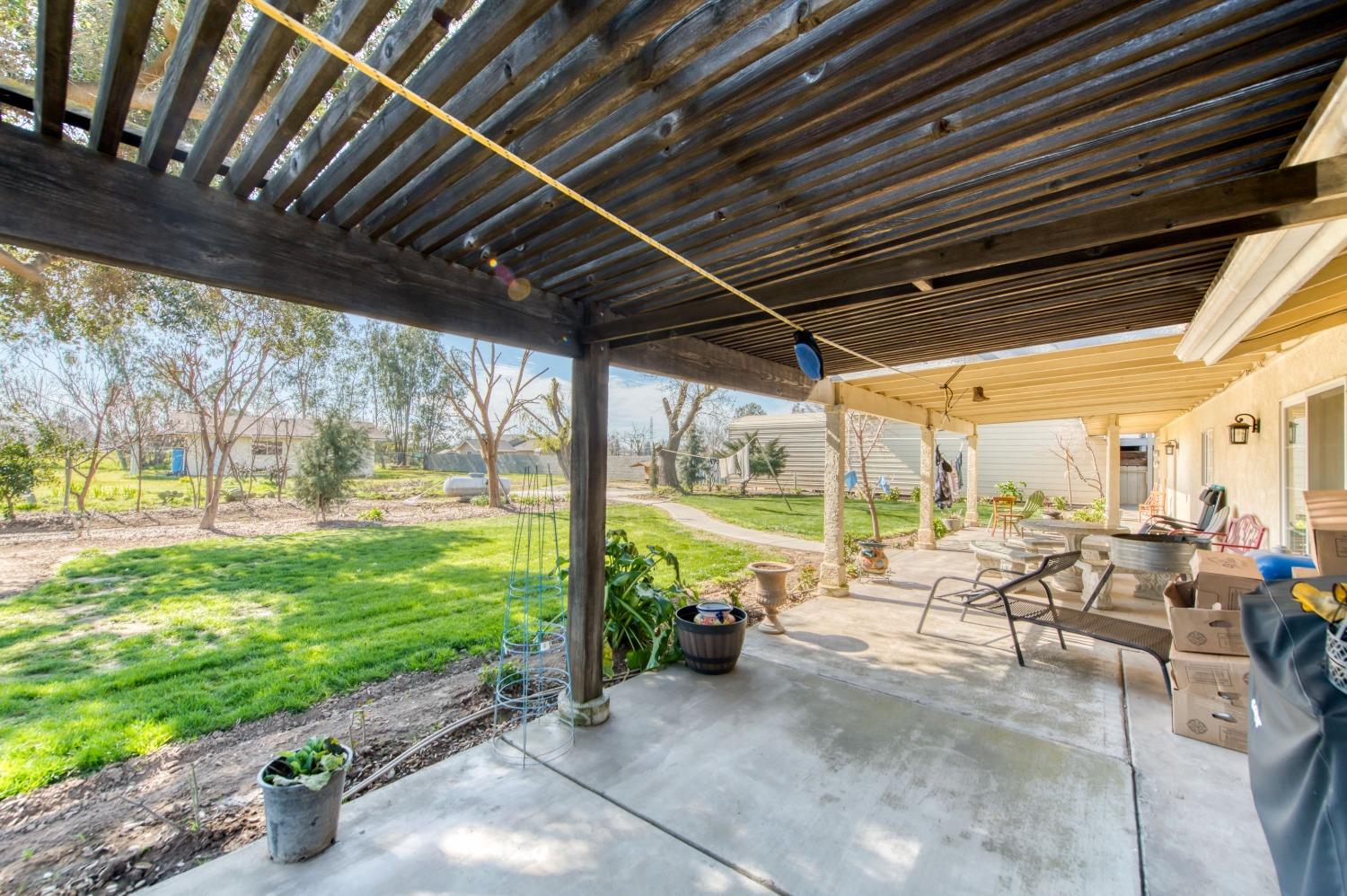 25540 Lynn Place, Unit B Madera, CA 93638 - Photo 33 of 37 a view of swimming pool with outdoor seating