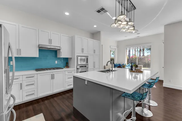 a living room with furniture and a couch