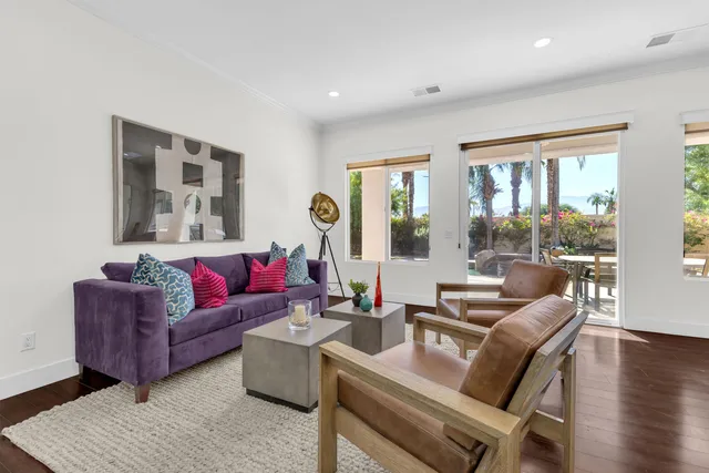 a kitchen with granite countertop cabinets and a stove top oven