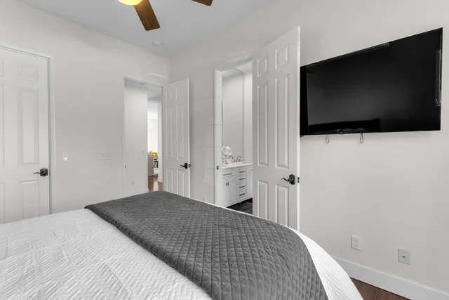 a bath tub sitting next to a window