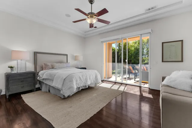 a view of a swimming pool with a yard