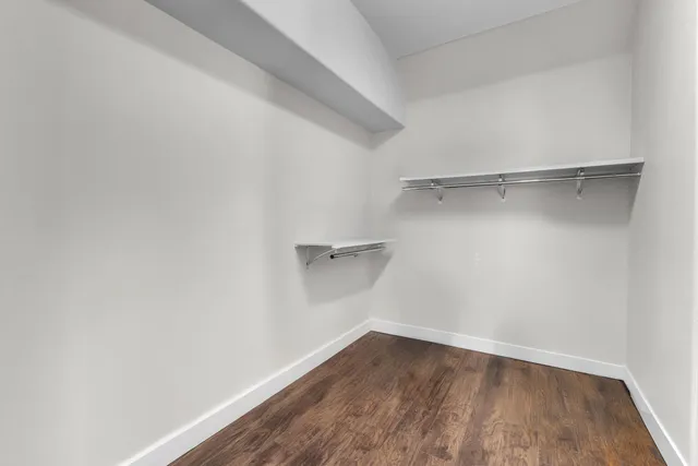 a front view of a house with swimming pool having outdoor seating