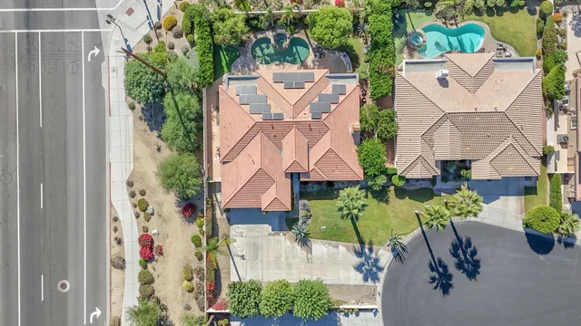 a very nice looking dining room with a rug and a dining table