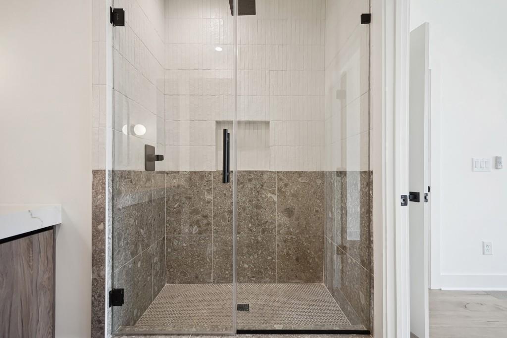 1570 Flat Shoals Road Southeast, Unit 7 Atlanta, GA 30316 - Photo 18 of 35 a bathroom with a shower