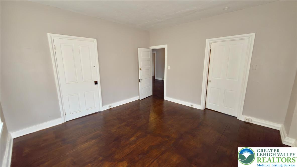 1236 Main Street, Unit 2 Hellertown, PA 18055 - Photo 14 of 29 an empty room with wooden floor