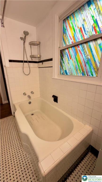 1236 Main Street, Unit 2 Hellertown, PA 18055 - Photo 28 of 29 a bathroom with a bathtub and a shower
