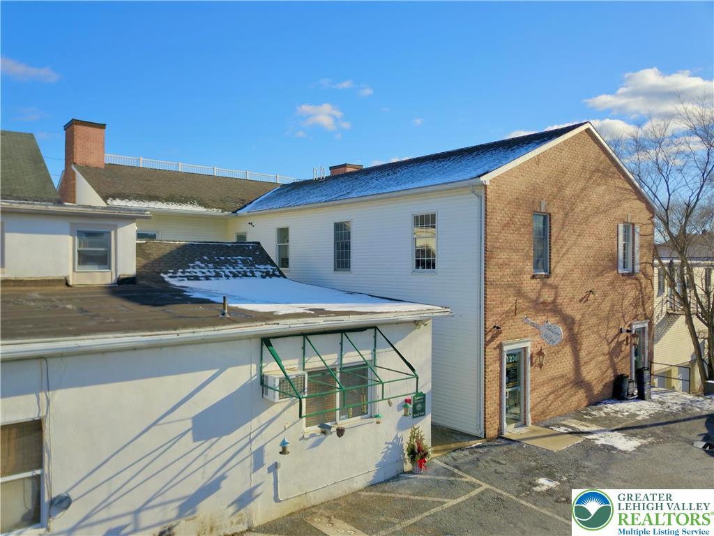 1236 Main Street, Unit 2 Hellertown, PA 18055 - Photo 3 of 29 a front view of a house