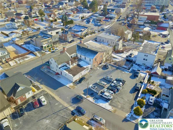an aerial view of a city with lots of residential buildings
