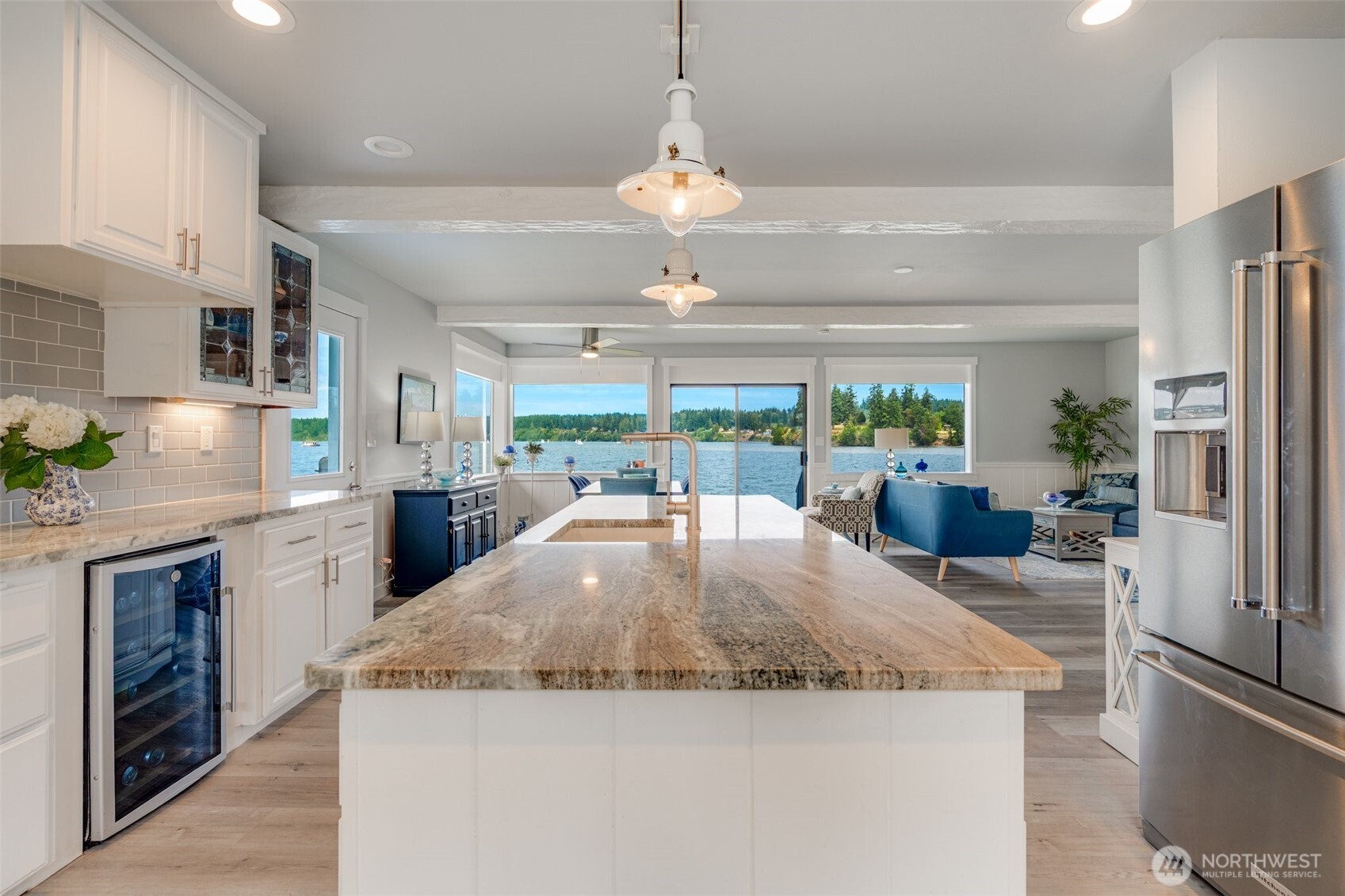 5341 South Bercot Road Freeland, WA 98249 - Photo 11 of 37 a kitchen with stainless steel appliances granite countertop a kitchen island a stove and a sink