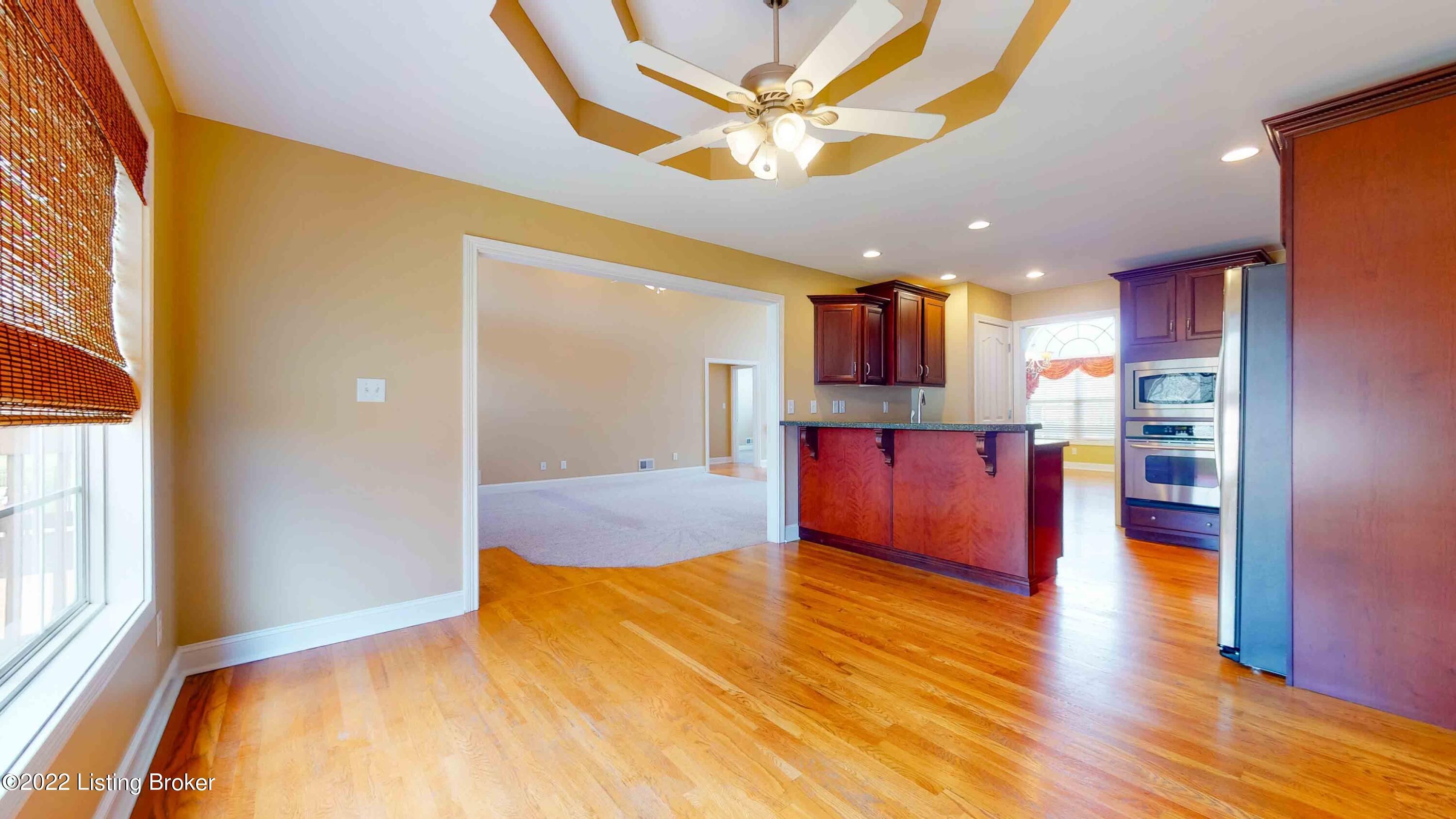 8307 Old Toll Road Louisville, KY 40291 - Photo 12 of 38 View of great room from kitchen dining area