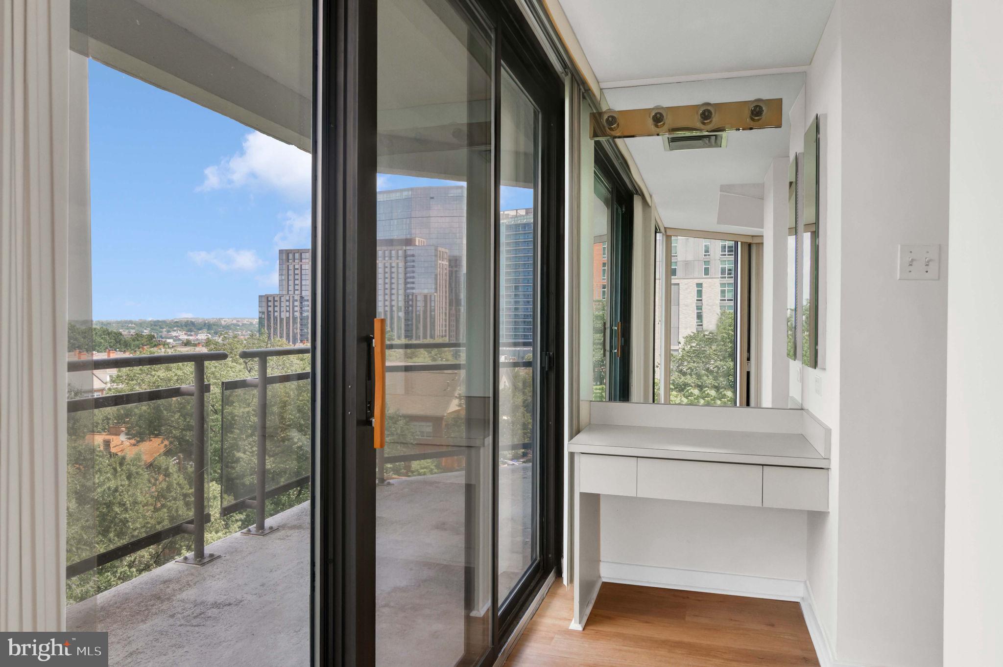 1530 Key Boulevard, Unit 715 Arlington, VA 22209 - Photo 20 of 41 a view of a glass door and a living room