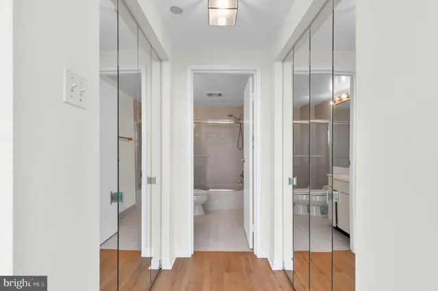 a view of a bathroom with a glass door